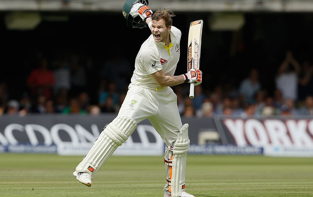 Australia's Steven Smith celebrates getting 200 runs on the second day of the second Ashes Test match between England and Australia, at Lord's cricket ground in London.