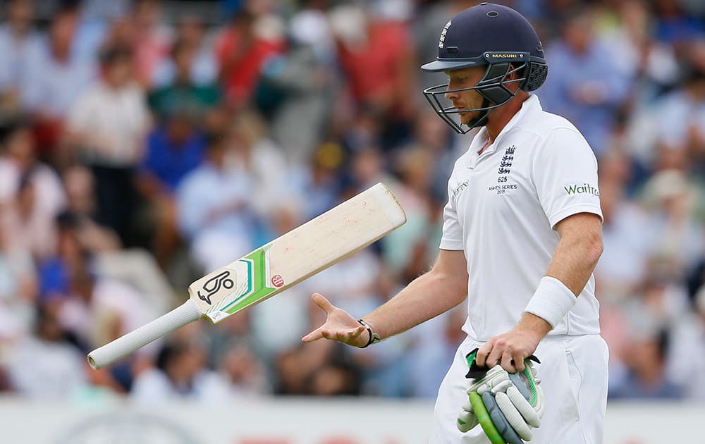 England's Ian Bell throws his bat as he leaves the pitch after being bowled by Australia's Josh Hazlewood on the second day of the second Ashes Test match between England and Australia, at Lord's cricket ground in London.