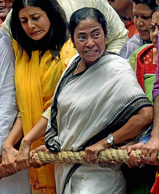 West Bengal Chief Minister Mamata Banerjee and Tollywood actor Koel Mallick pulls the Lord Jagannath chariot during ISKCON Rathyatra in Kolkata.