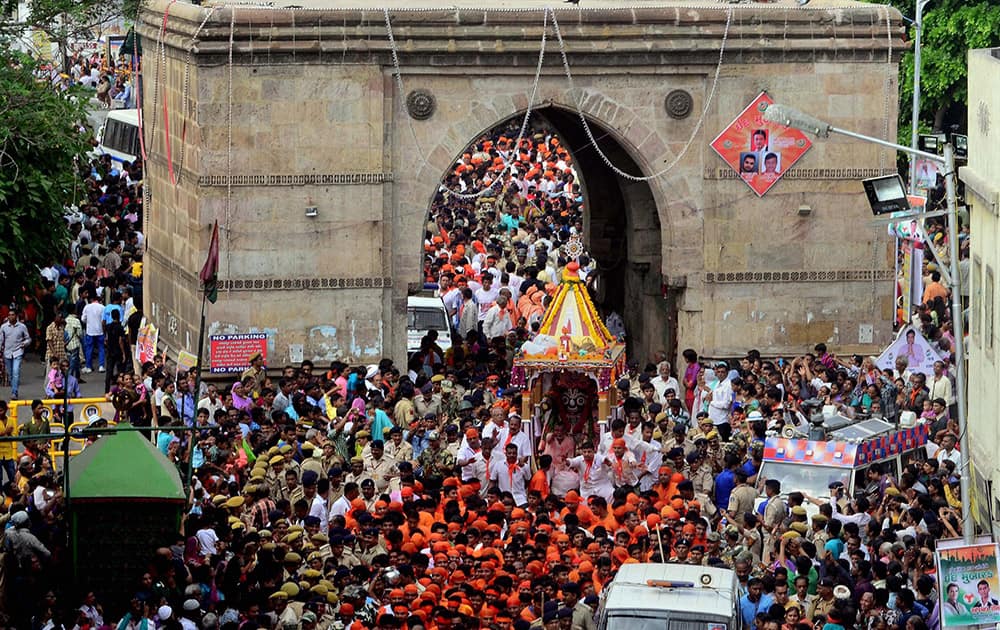 Devotees take part in 138th Rath Yatra of Lord Jagannath that passes through Jamal Gate in Ahmedabad.