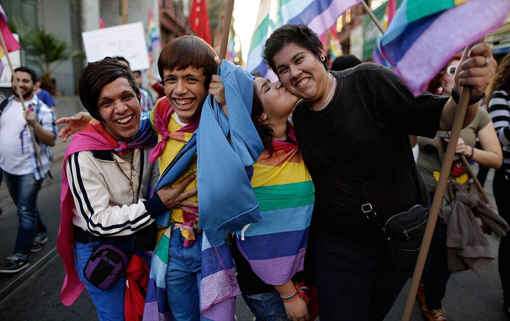 Revelers strike a pose during the 