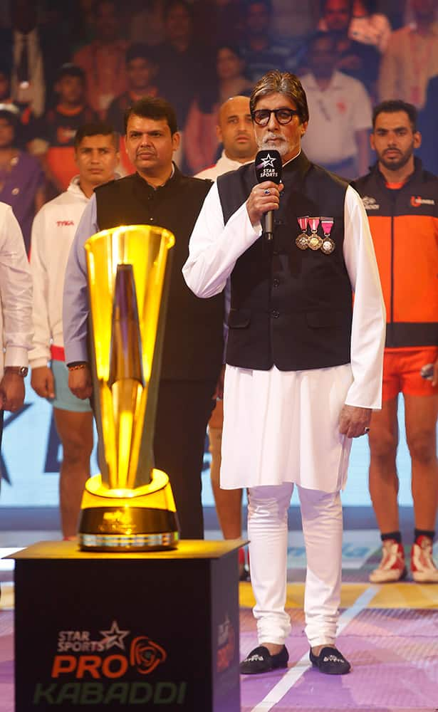 Amitabh Bachchan sings the national anthem on the inaugural session of Pro-Kabaddi League 2015 in Mumbai.