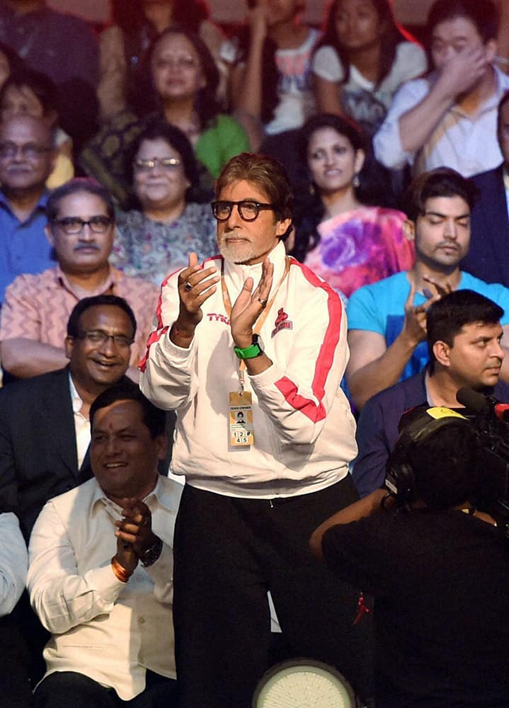 Amitabh Bachchan cheers during the opening ceremony of Pro kabaddi League match between, Jaipur Pink Panther and U Mumbai in Mumbai.