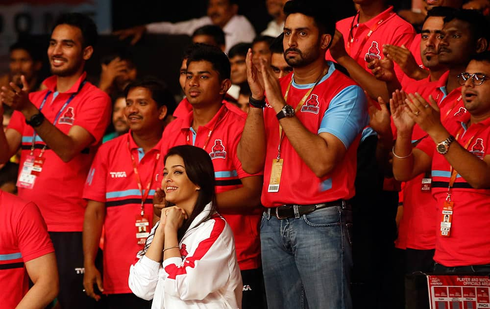 Abhishek Bachchan and his wife and actress Aishwarya Rai Bachchan watch the inaugural match of Pro-Kabaddi League 2015 between U Mumba and Jaipur Pink Panthers in Mumbai.