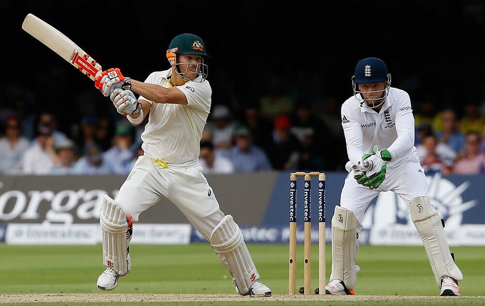 Australia's David Warner plays a shot off the bowling of England's Moeen Ali on the third day of the second Ashes Test match between England and Australia, at Lord's cricket ground in London.