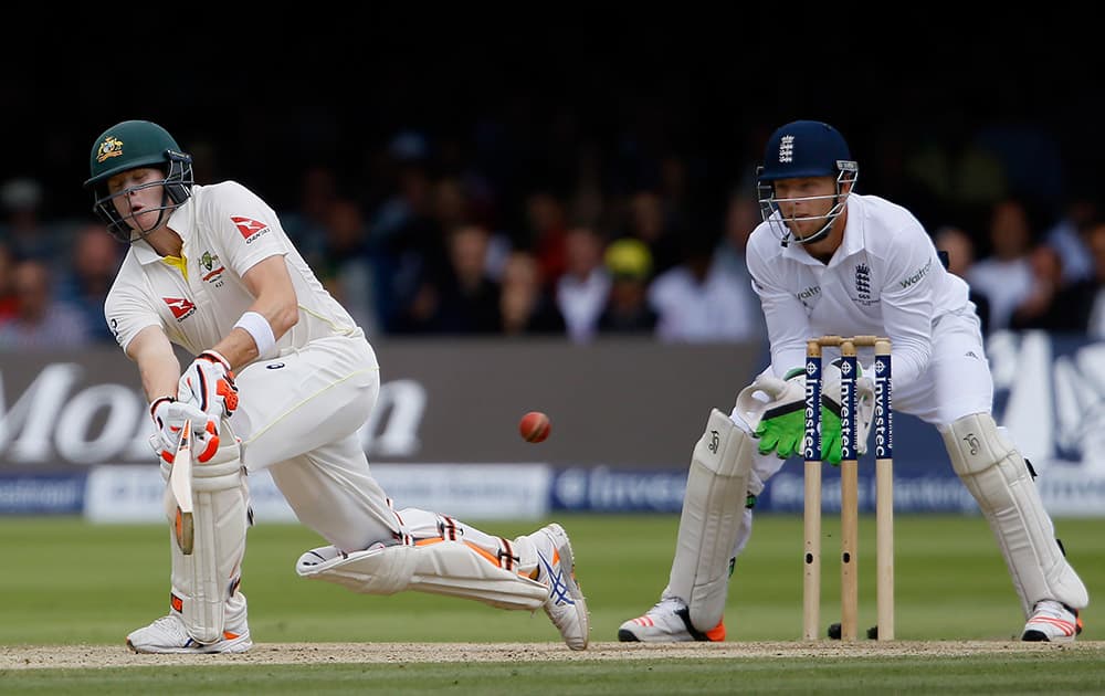 Australia's Steven Smith plays a shot off the bowling of England's Moeen Ali on the fourth day of the second Ashes Test match between England and Australia, at Lord's cricket ground in London.