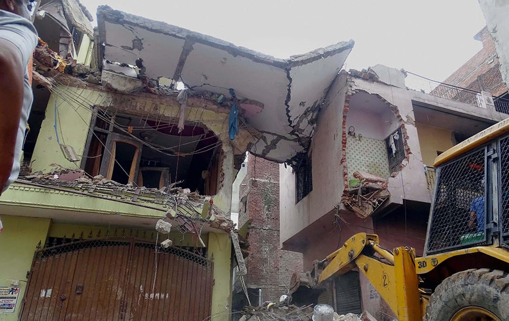 A four-storey building which collapses in the Vishnu Garden area of West Delhi.