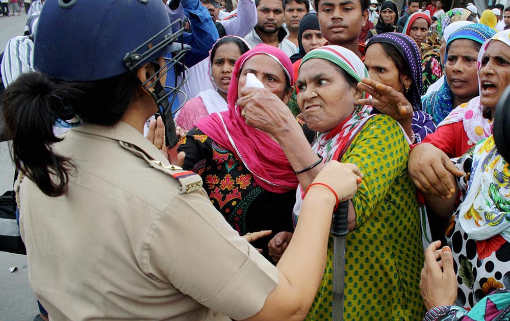 Family and community members of a youth died yesterday in Meerut clash with police during a protest.