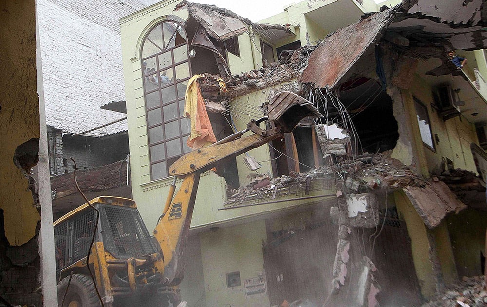A view of four-storey building collapsed in the Vishnu Garden area of West Delhi.