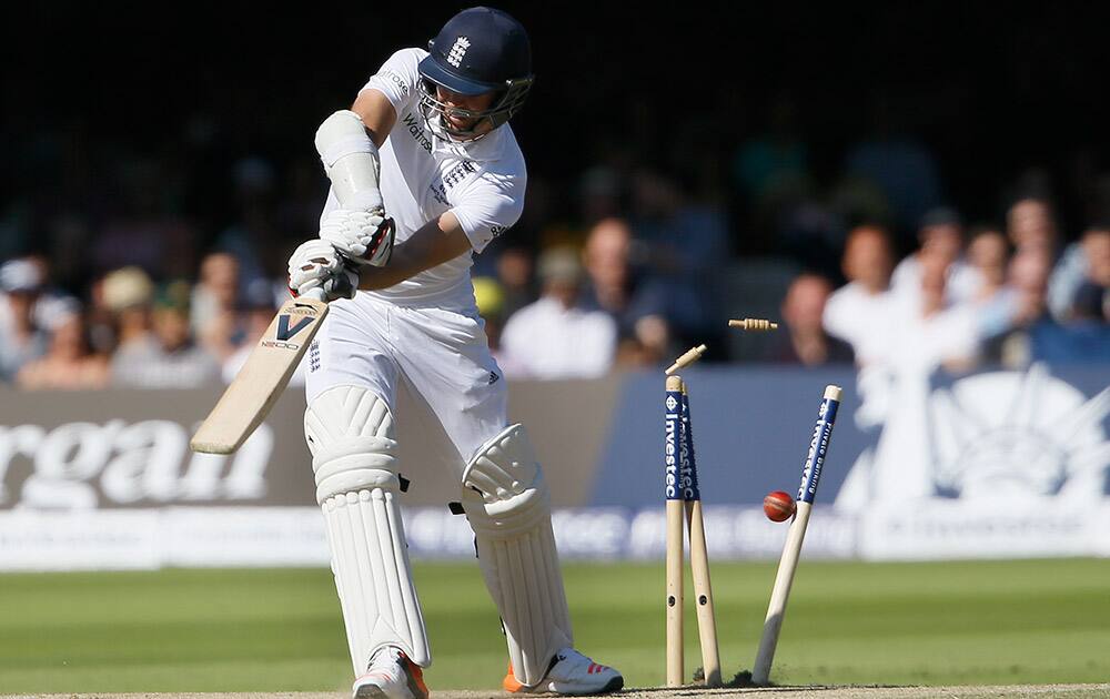 England's James Anderson is bowled by Australia's Josh Hazlewood on the fourth day of the second Ashes Test match between England and Australia, at Lord's cricket ground in London.