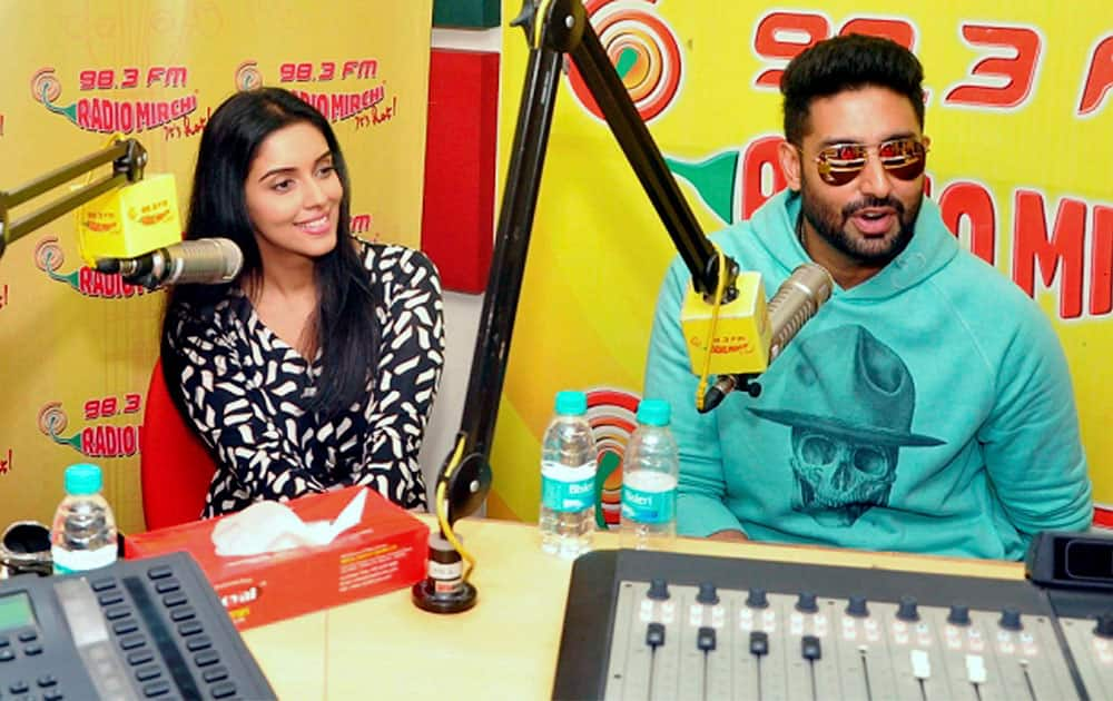 Bollywood actors Abhishek Bachchan and Asin at Radio Mirchi studio to promote their upcoming film All is Well.