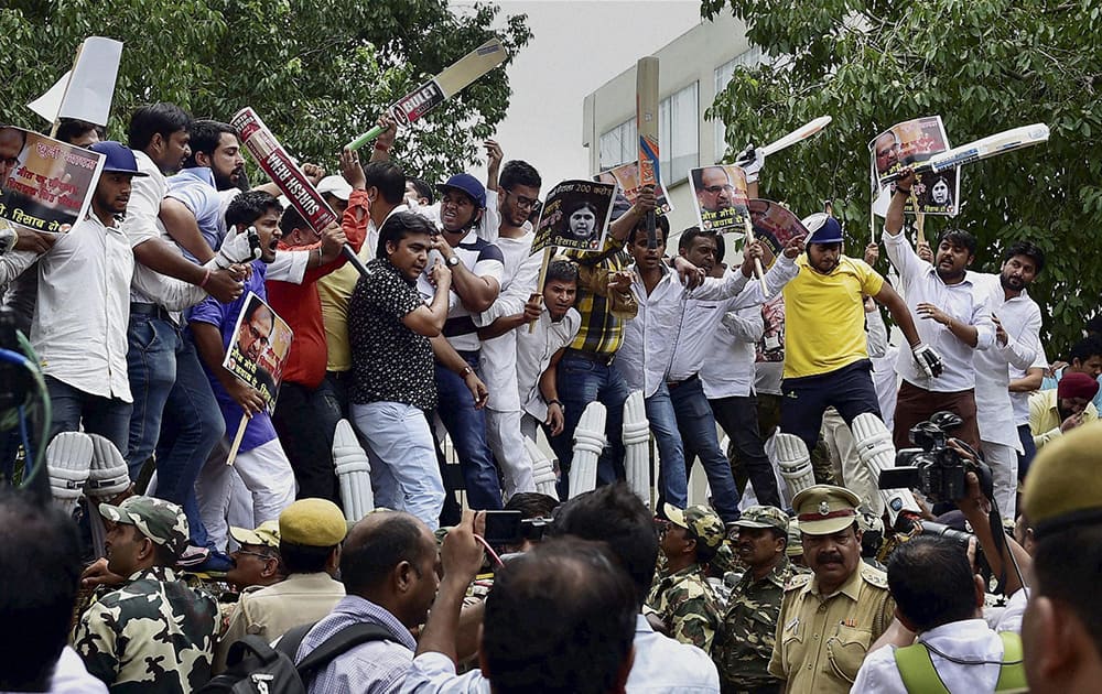 Youth Congress workers at a protest against the Bharatiya Janata Party (BJP)-led Government outside the Parliament, in New Delhi.