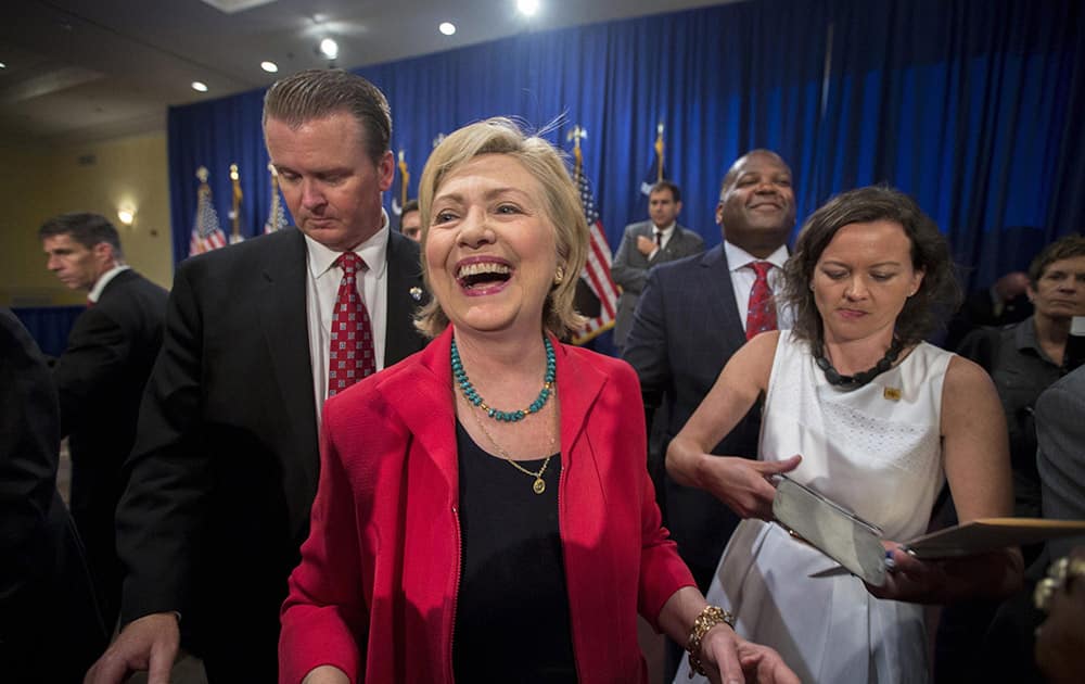 Democratic presidential hopeful Hillary Rodham Clinton greets supporters after a campaign event, in Columbia, S.C. Clinton talked about what she said was a lack of educational and economic opportunities, and a criminal justice system that treats blacks more harshly than whites. 