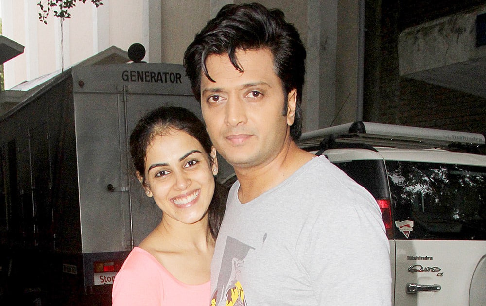 Riteish and Genelia Deshmukh look oh-so-adorable together. The couple enjoyed the rains in the burbs in Mumbai. DNA