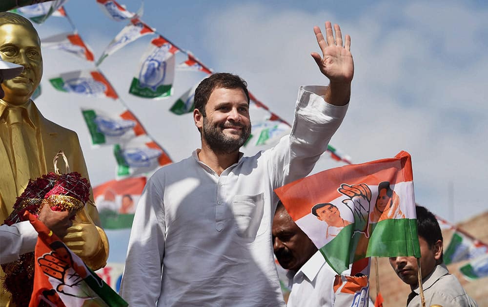 Congress Vice President Rahul Gandhi waves at the start of his Raitu Bharosa Yatra at a village in Anantapur district of Andhra Pradesh.