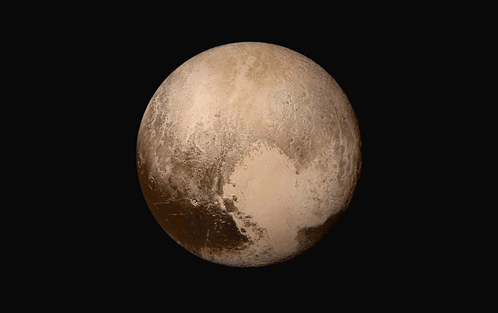 This image made available by NASA, shows Pluto made by combining several images from two cameras on the New Horizons spacecraft. The images were taken when the spacecraft was 280,000 miles (450,000 kilometers) away from Pluto.