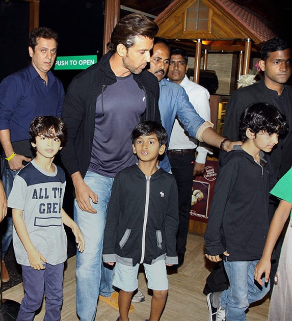 Bollywood actor Hrithik Roshan along with his sons spotted outside a theatre in Mumbai.