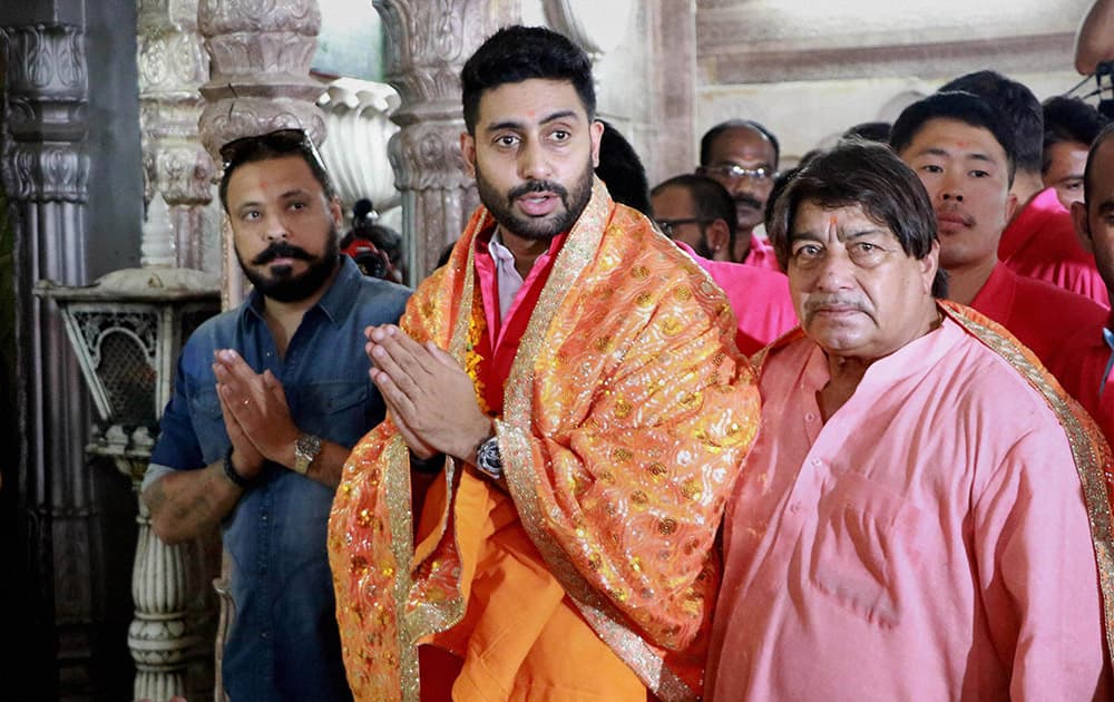 Bollywood actor & owner of Jaipur Pink Panthers Kabaddi team Abhishek Bachchan with team players visit the Ganesha Temple at Moti Doongari ahead of the Pro Kabaddi league matches, in Jaipur.