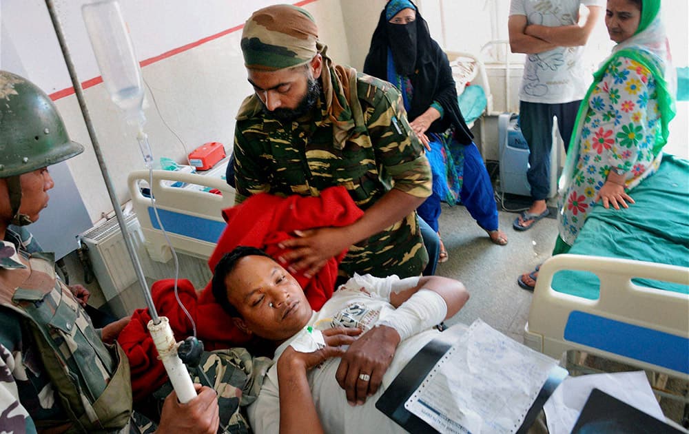 An injured CRPF jawan being treated at a Local hospital in Anantnag on Saturday after a grenade attack by the militants.