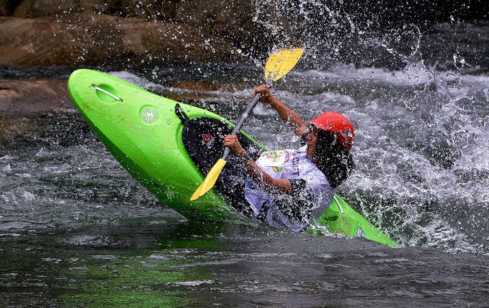 A participant at Water Kayaking Championship as part of Malabar River festival at Pulikkayam in Kozhikode.