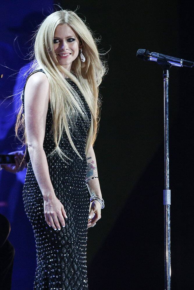 Avril Lavigne performs at the Opening Ceremony of the 2015 Special Olympics World Games at Los Angeles Memorial Coliseum.