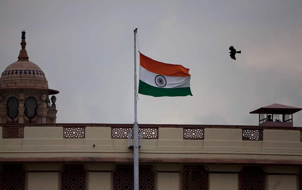 India's flag is flown at half-mast at the Parliament House as a mark of respect for former President A.P.J. Abdul Kalam who died at the age of 83, in New Delhi, India.