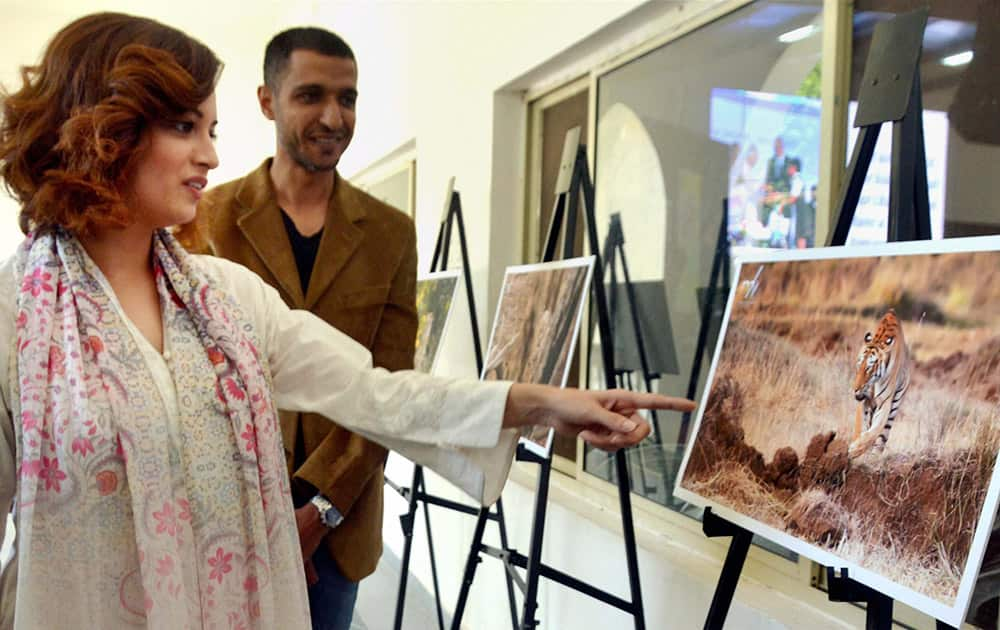 Dia Mirza looking at students’ special photo exhibition organised to mark ‘World Tiger Day’ in Hyderabad.