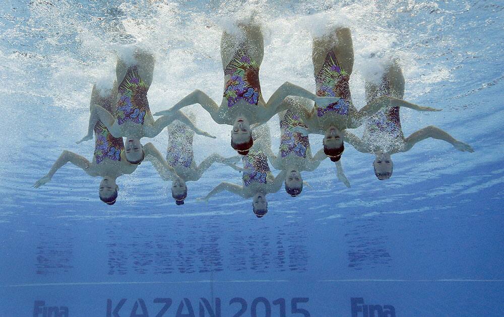 The team of USA performs during the synchronised swimming team free preliminary at the Swimming World Championships in Kazan, Russia.