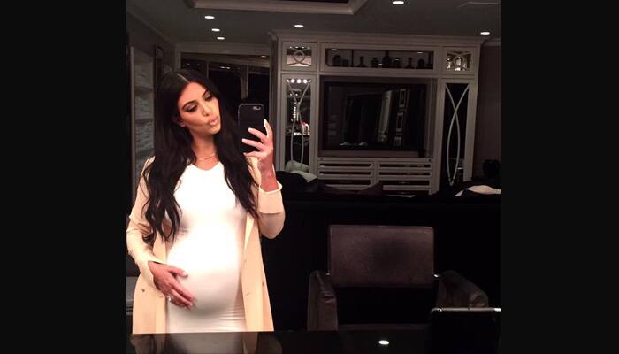 Kim Kardashian accused of faking her baby bump in new selfie