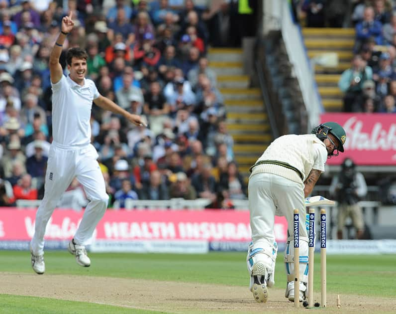 Australia’s Michael Clarke is bowled by England’s Steven Finn for 10 runs during day one of the third Ashes Test cricket match, at Edgbaston, Birmingham, England.