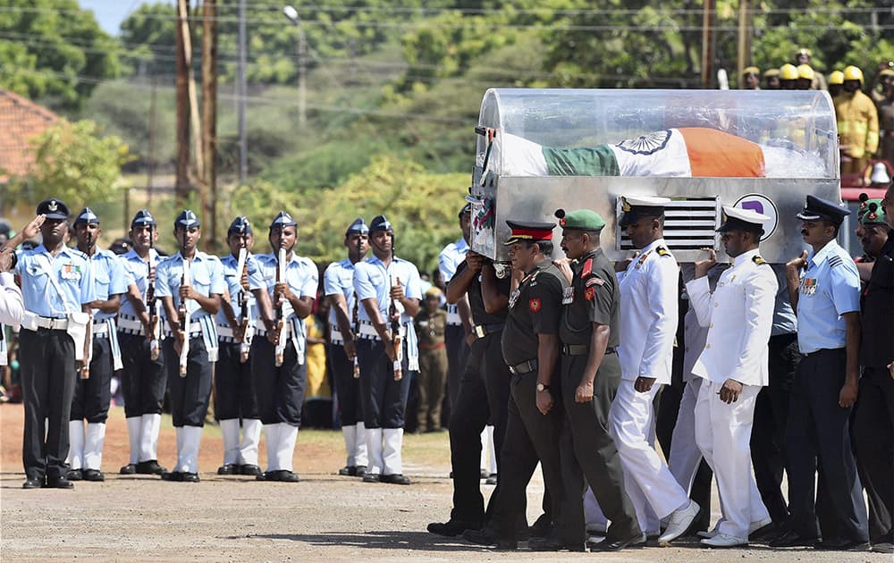 Tri-services personnel carry the mortal remains of former President APJ Abdul Kalam at Mandapam Helipad ground in Rameswaram.