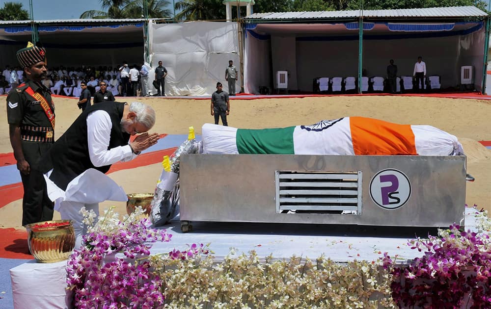 Prime Minister Narendra Modi pays homage to former President APJ Abdul Kalam at his burial site in Rameswaram.