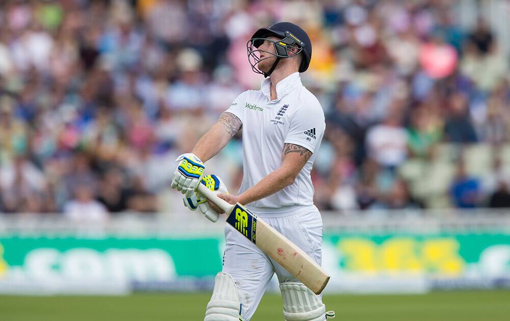 England's Ben Stokes walks from the pitch after being caught on 0 by Peter Nevill off the bowling of Australia's Mitchell Johnson on the second day of the third Test match of the five match series between England and Australia at Edgbaston cricket ground in Birmingham, England.