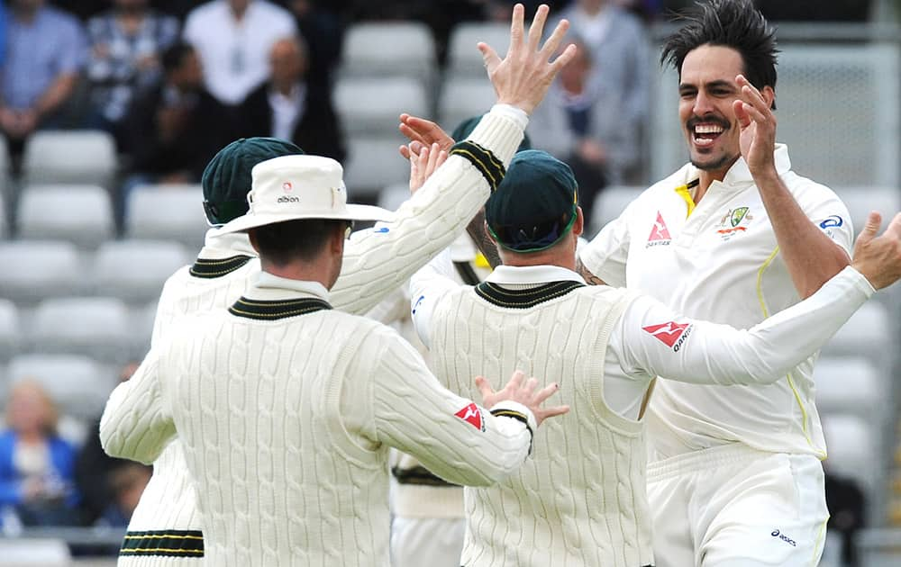 Australia’s Mitchell Johnson celebrates England’s Ben Stokes wicket during day two of the third Ashes Test cricket match, at Edgbaston, Birmingham, England.