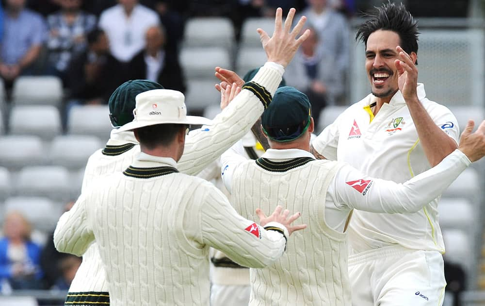 Australia’s Mitchell Johnson celebrates England’s Ben Stokes wicket during day two of the third Ashes Test cricket match, at Edgbaston, Birmingham, England.