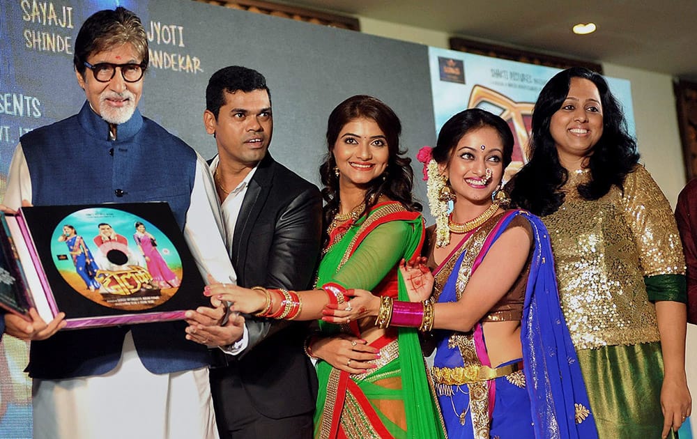 Bollywood actor Amitabh Bachchan, Marathi film actors Siddharath Jadhav, Manasi Naik and Marathi filmmaker Shirish Pattan Shetty during the music launch of film Dholki in Mumbai.