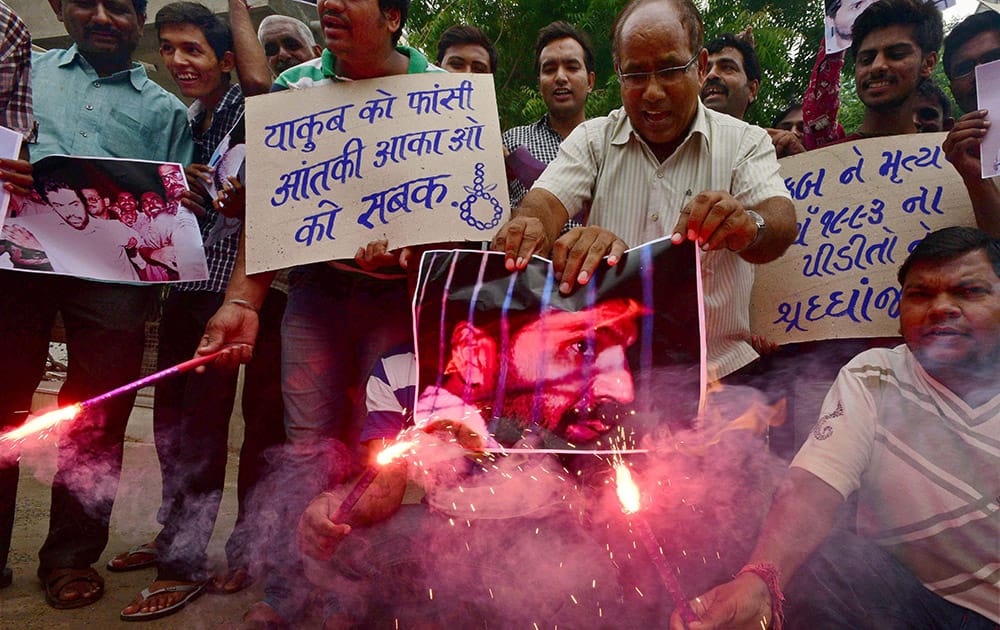 People celebrate the hanging of 1993 Bombay blast accused Yakub Memon with fire crackers in Ahmedabad.