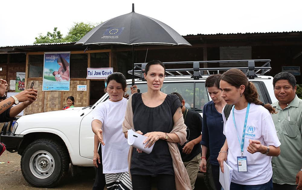 Actress Angelina Jolie Pitt, United Nations High Commissioner for Refugees special envoy and co-founder of the Preventing Sexual Violence Initiative, visits Jan Mai Kaung refugee camp in Myitkyina, Kachin State, Myanmar. The refugees have fled fighting between the Burmese government and the Kachin Independence Army since 2011.