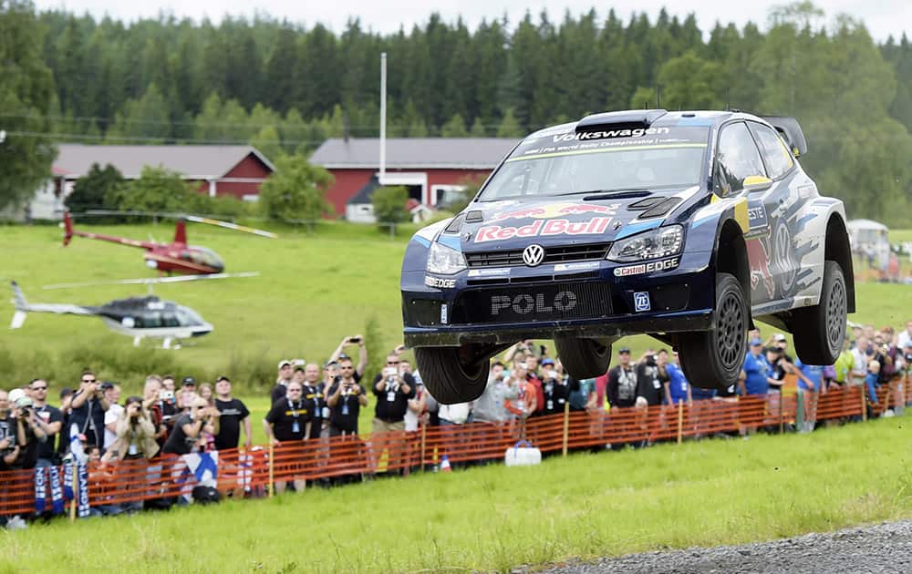 Norwegian Volkswagen Polo R WRC driver Andreas Mikkelsen and co-pilot Ola Floene get airborne during the Ouninpohja special stage of the 2015 FIA World Rally Championship WRC Rally of Finland in Jyvaskyla, Finland.