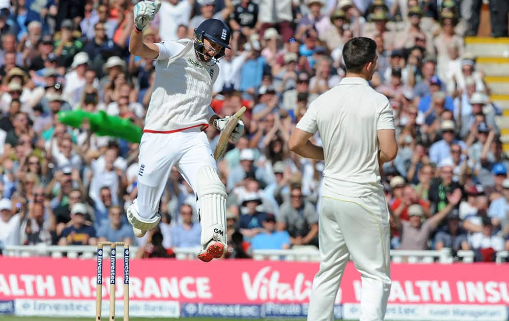 England’s Joe Root celebrates after England beat Australia by 8 wickets during day three of the third Ashes Test cricket match, at Edgbaston, Birmingham, England.