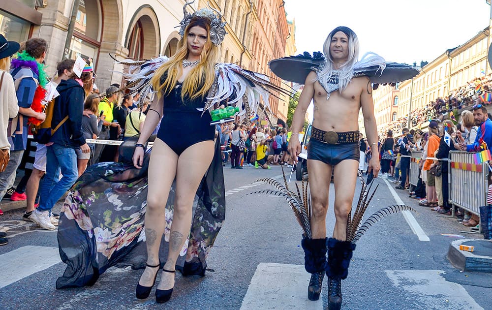Participants walk in the annual gay Pride Parade in Stockholm.