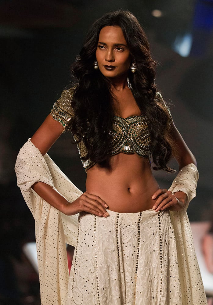 A models displays a creation by designer Monisha Jaising at the Amazon India Couture Week 2015 in New Delhi.