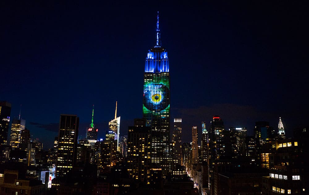 Large images of endangered species are projected on the south facade of The Empire State Building.