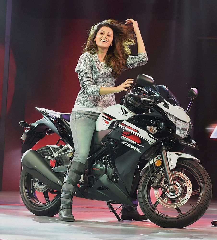 Honda Brand Ambassador Tapsee Pannu riding a Honda CBR bike during its launch in New Delhi.