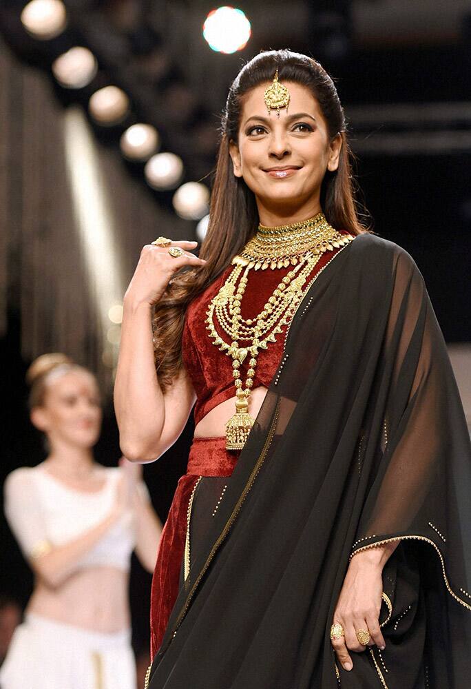 Juhi Chawla walks the ramp at India International Jewellery Week in Mumbai.