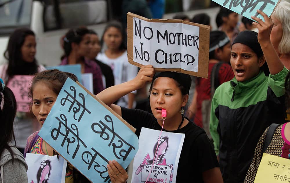 Nepalese women activists participate in a protest demanding provision in the new constitution to avail citizenship in the name of one’s mother, in Kathmandu, Nepal.