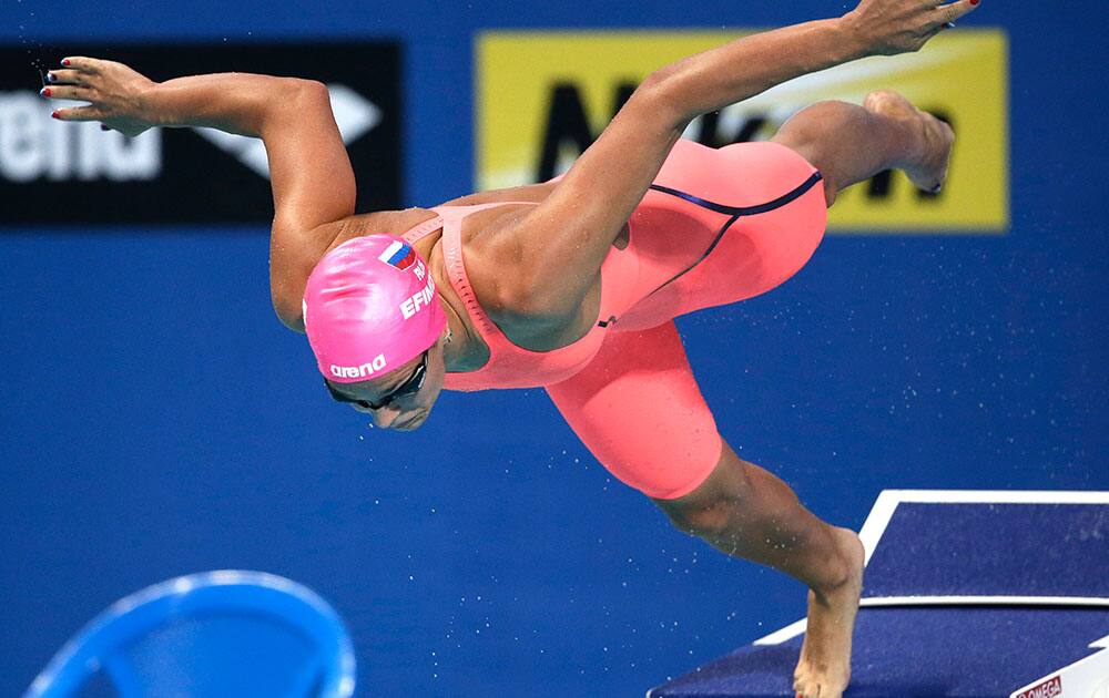 Russia's Yulia Efimova starts in the women's 100m breaststroke final at the Swimming World Championships in Kazan, Russia.