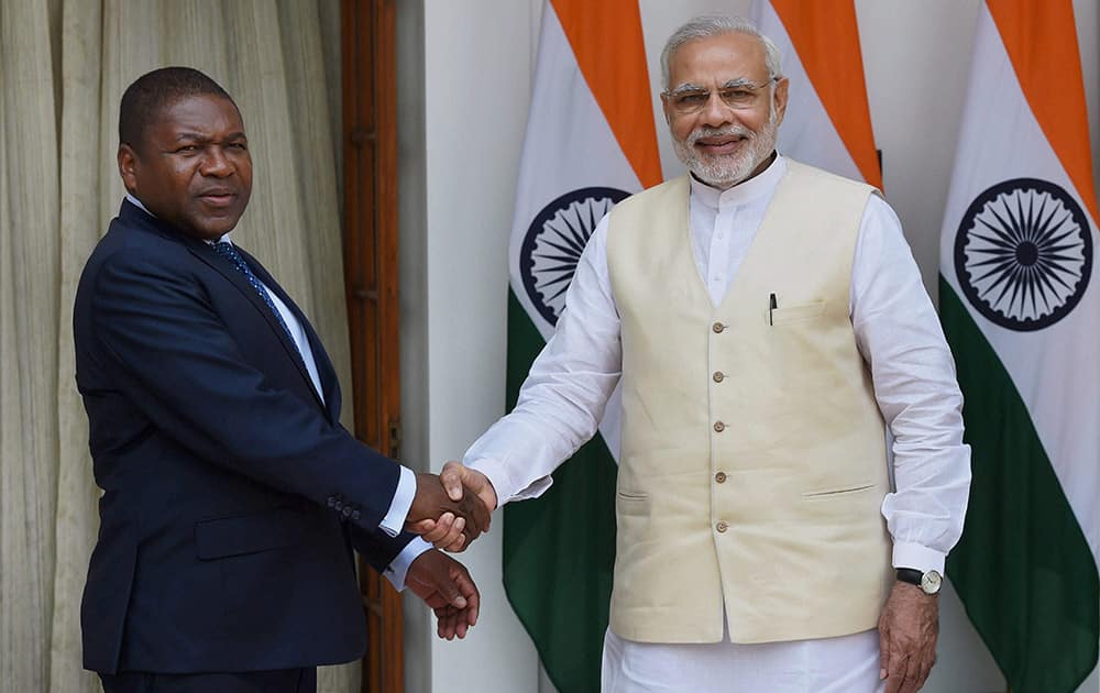 Prime Minister Narendra Modi and Mozambique President Filipe Jacinto Nyusi shake hands before a meeting at Hyderabad House in New Delhi.