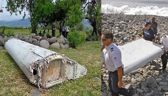 Seat cushion, window panes found on island as Malaysia confirms flaperon as MH370 part