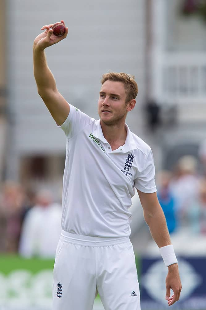 England's Stuart Broad raises the ball after taking 5 wickets for 19 runs on the first day of the fourth Ashes test cricket match between England and Australia at Trent Bridge cricket ground in Nottingham, England.